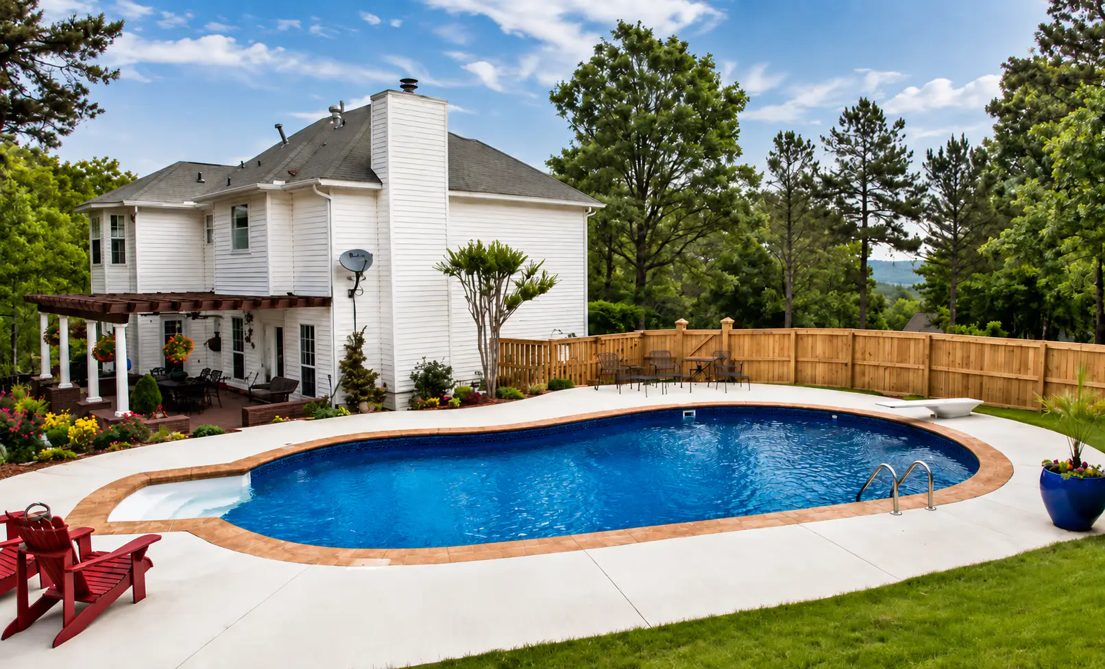 Curved inground vinyl liner pool built by Elite Pools by Aloha in Central Arkansas